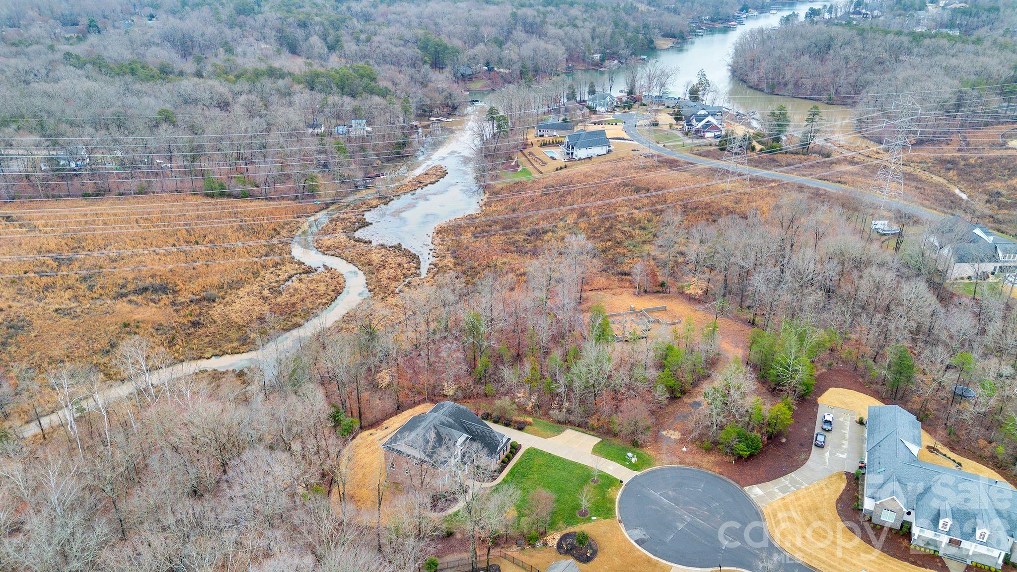 663 Highland Ridge Point Lake Wylie, SC 29710 - Photo 3 of 42 a view of a swimming pool with a yard