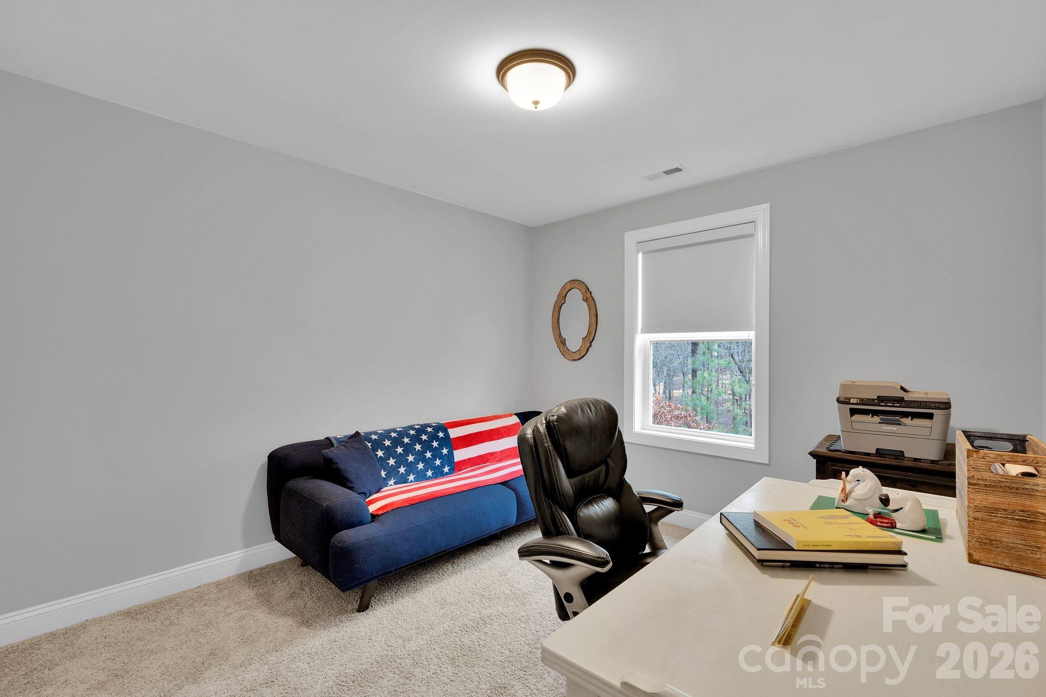 663 Highland Ridge Point Lake Wylie, SC 29710 - Photo 31 of 42 a living room with furniture and a window