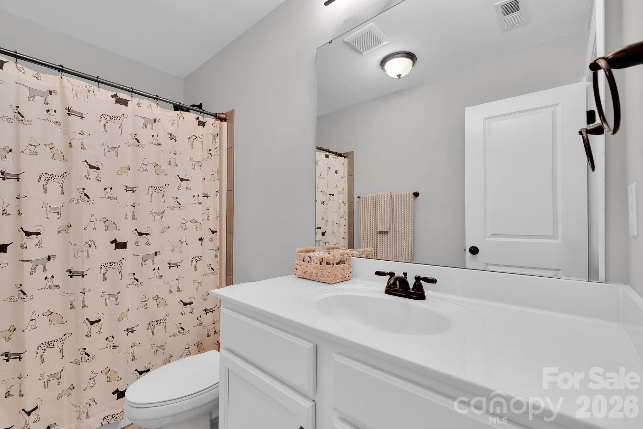 663 Highland Ridge Point Lake Wylie, SC 29710 - Photo 32 of 42 a bathroom with a sink toilet and shower