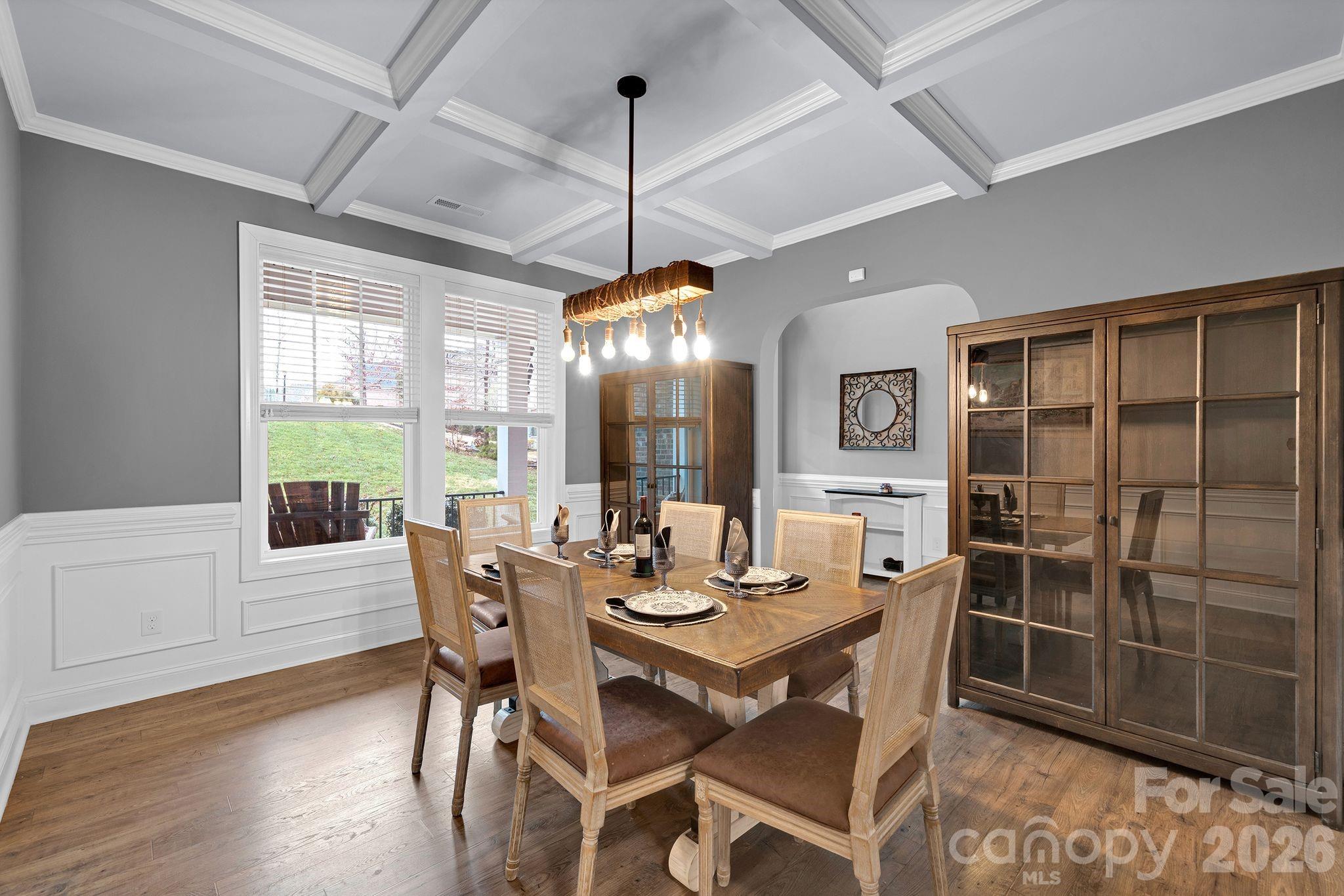 663 Highland Ridge Point Lake Wylie, SC 29710 - Photo 5 of 42 a view of a dining room with furniture window and wooden floor