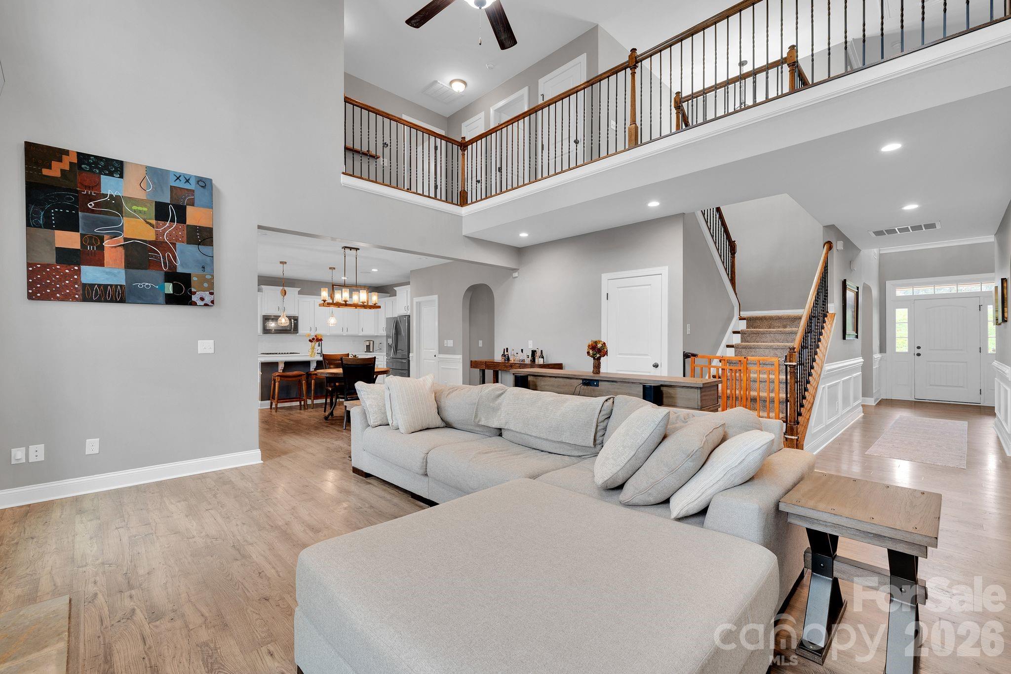 663 Highland Ridge Point Lake Wylie, SC 29710 - Photo 8 of 42 a living room with furniture and a ceiling fan