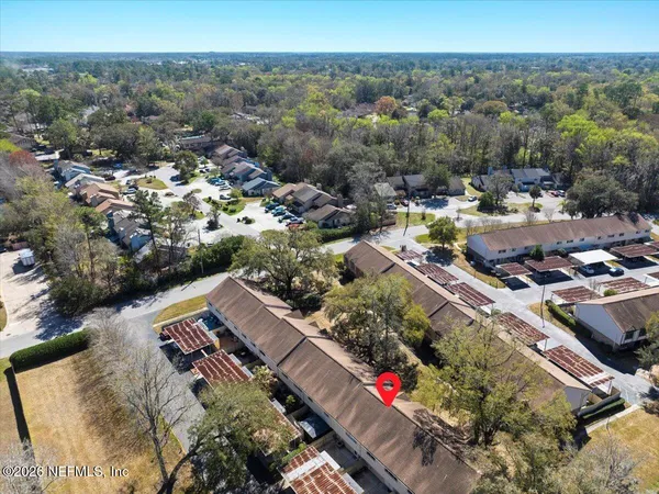 a room with furniture and pool table