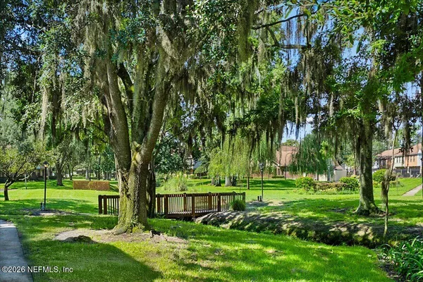 a room with furniture and a chandelier