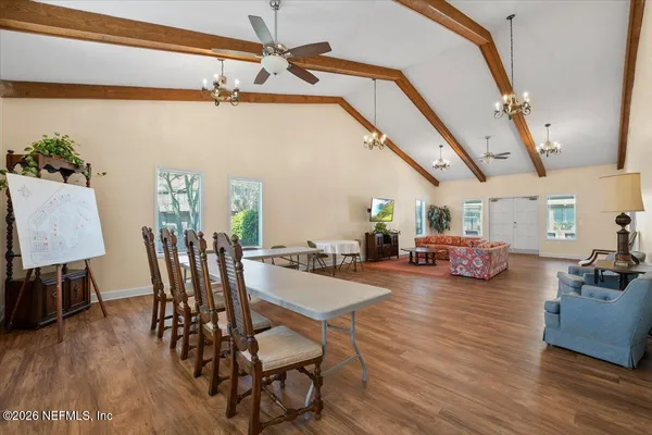view of hall way with furniture and rug