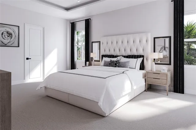 a bedroom with a bed and a large mirror