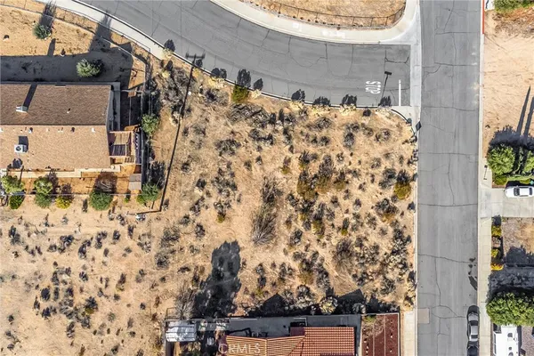 an aerial view of residential building and ocean