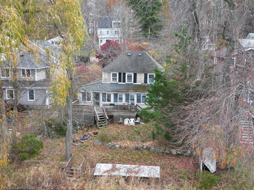 27 Taft Avenue Mendon, MA 01756 - Photo 1 of 8 a front view of a house with a yard