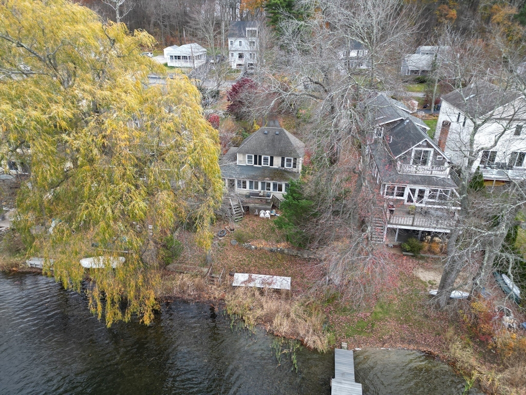 27 Taft Avenue Mendon, MA 01756 - Photo 2 of 8 a front view of a house with a yard