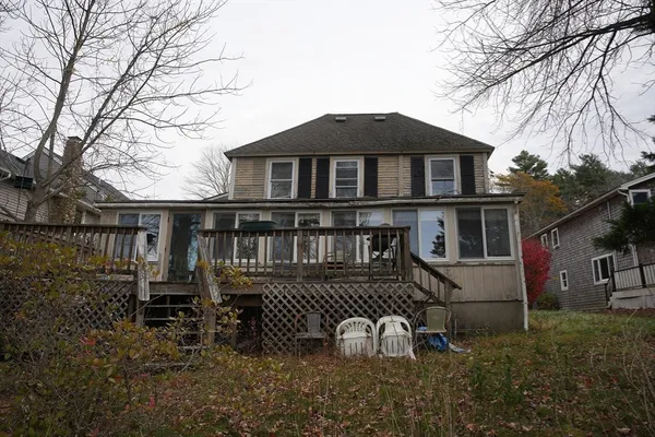 a front view of a house with yard
