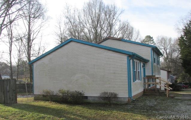 4720 Cheviot Road Charlotte, NC 28269 - Photo 2 of 15 a view of a house with a yard