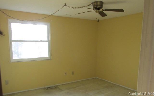 4720 Cheviot Road Charlotte, NC 28269 - Photo 14 of 15 a small space with a window and a fan