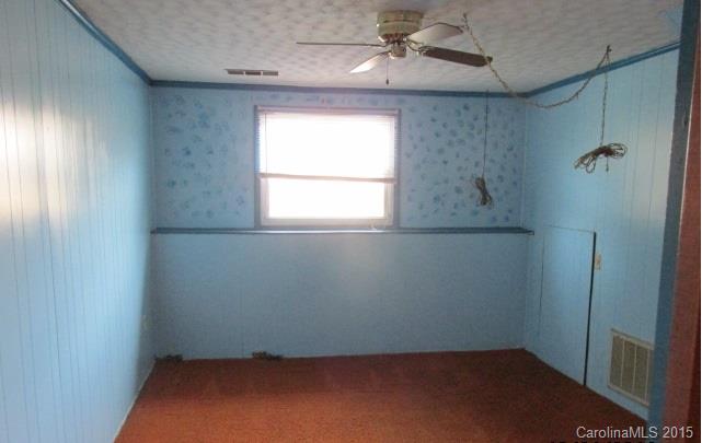 4720 Cheviot Road Charlotte, NC 28269 - Photo 8 of 15 an empty room with a window