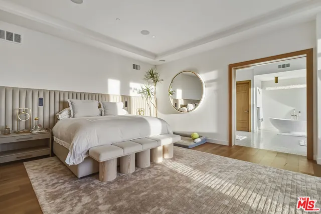 a kitchen with stainless steel appliances granite countertop a stove and a refrigerator