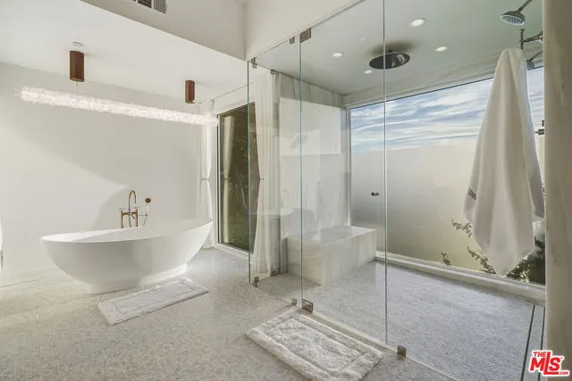 a room with gym equipment and a large window