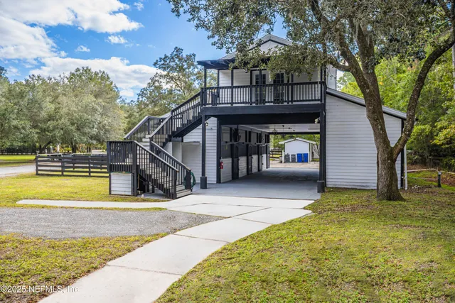 a view of residential house with wooden stairs