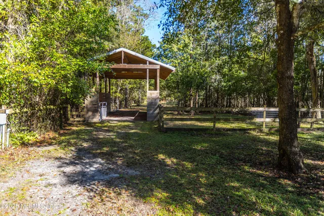 a view of outdoor space with lots of trees
