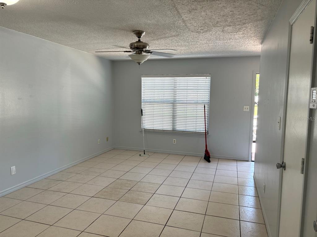2302 South Maki Road, Unit 25 Plant City, FL 33563 - Photo 3 of 8 a view of an empty room with a window