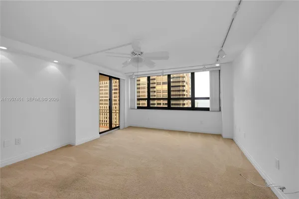 an empty room with windows