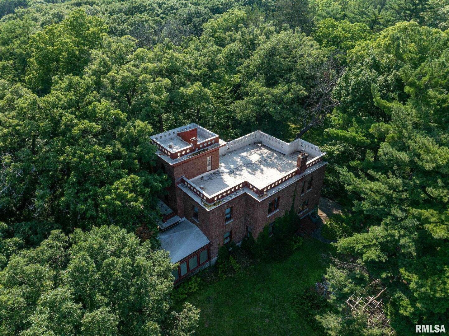 5418 Chapel Hill Road Davenport, IA 52802 - Photo 15 of 69 an aerial view of a house with a yard