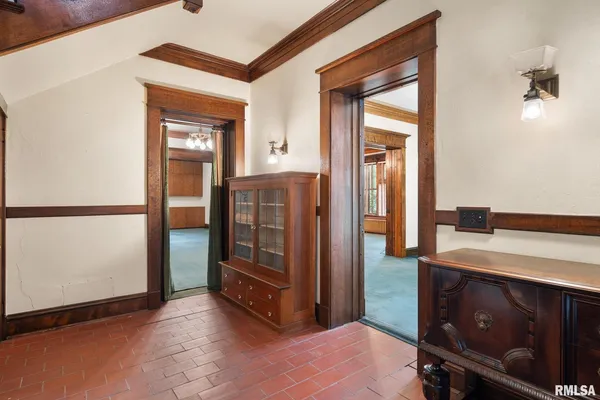 a kitchen with appliances cabinets and a window
