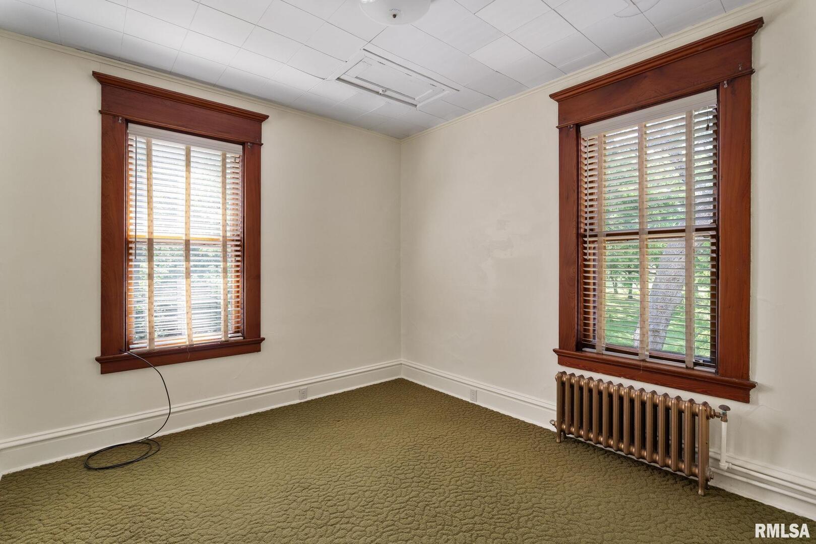 5418 Chapel Hill Road Davenport, IA 52802 - Photo 54 of 69 a view of an empty room with a window