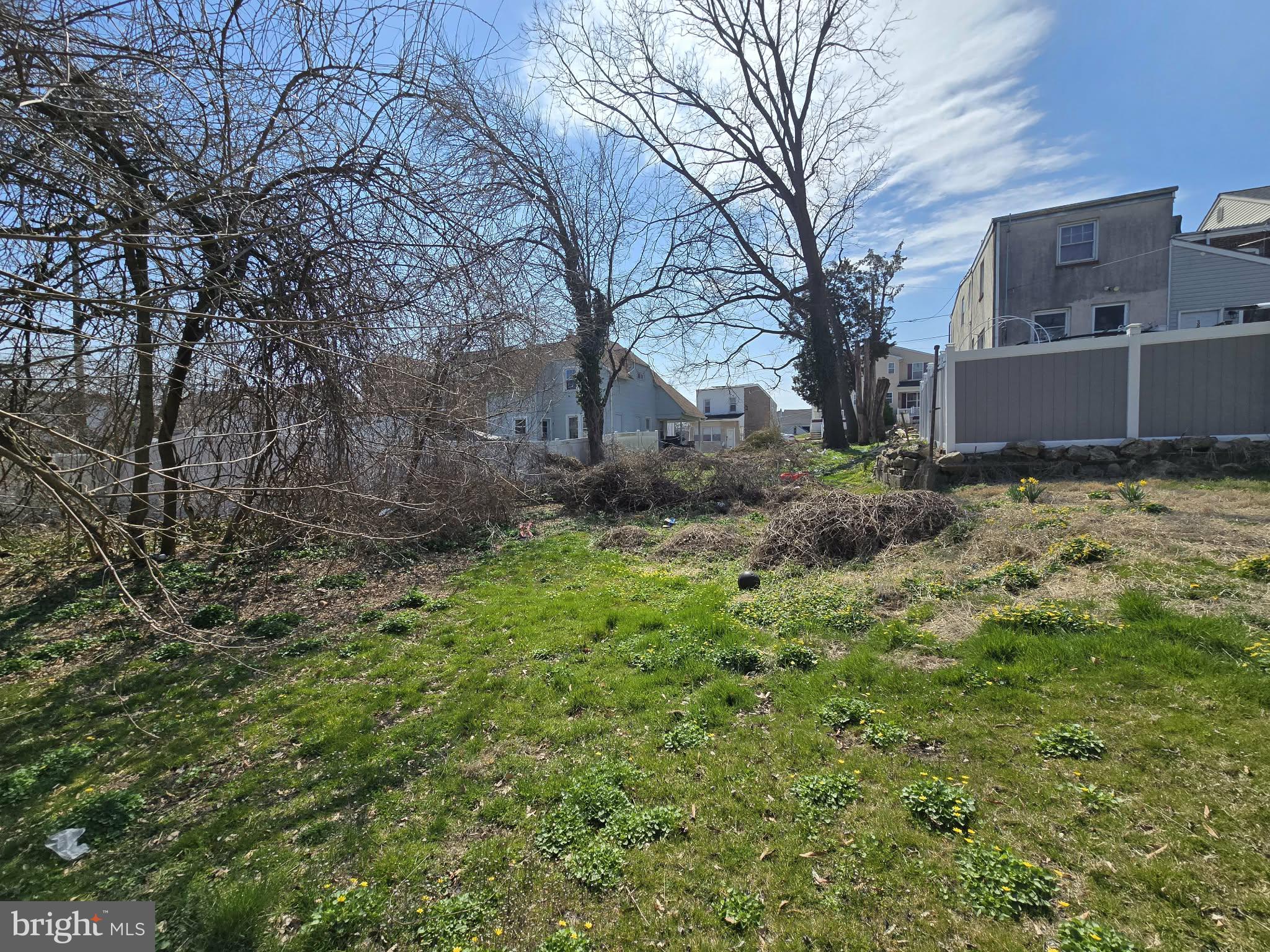 304 9th Street Brookhaven, PA 19015 - Photo 2 of 5 a backyard of a house with lots of green space