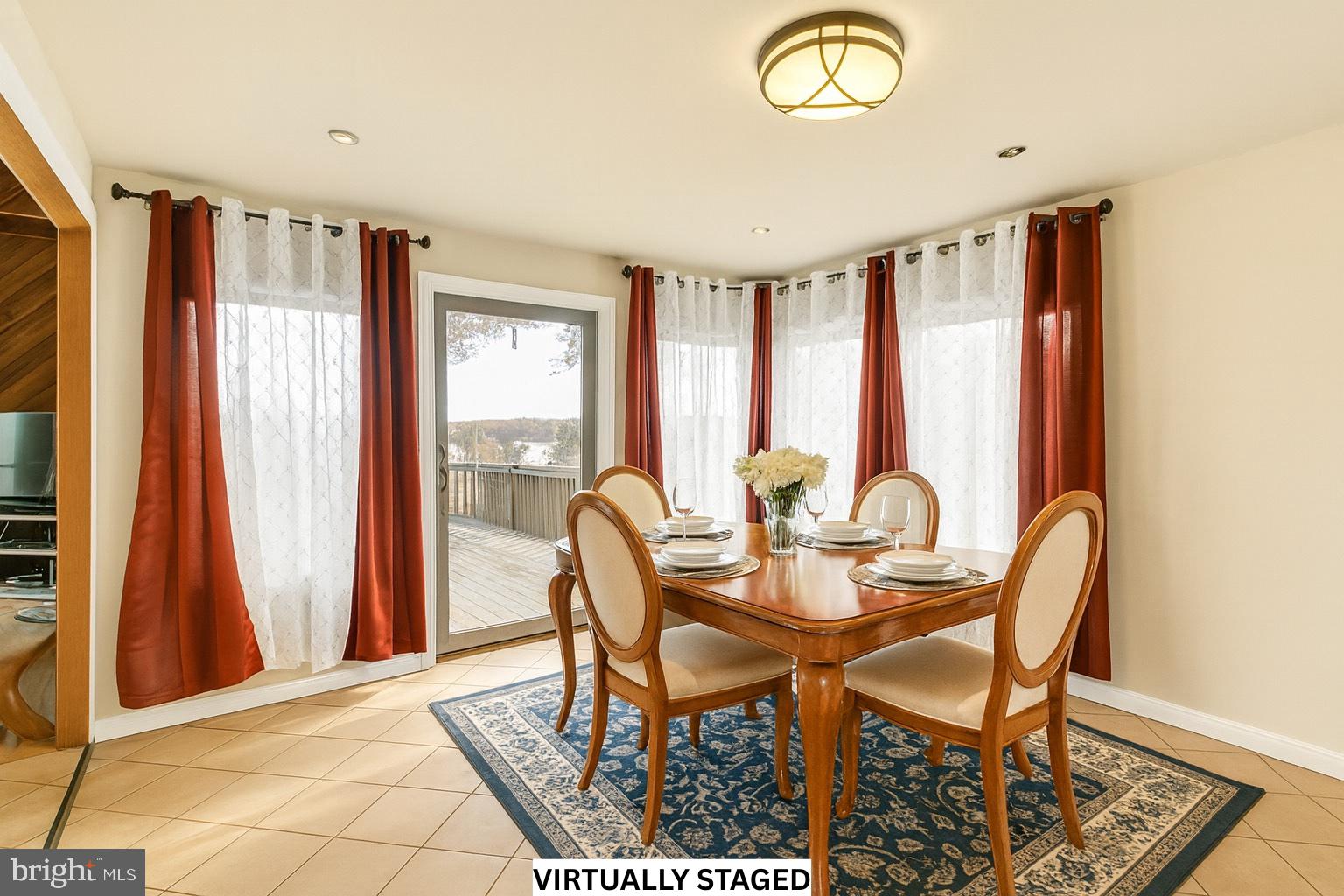310 Brush Neck Road Susan, VA 23163 - Photo 12 of 70 a view of a dining room with furniture and a window
