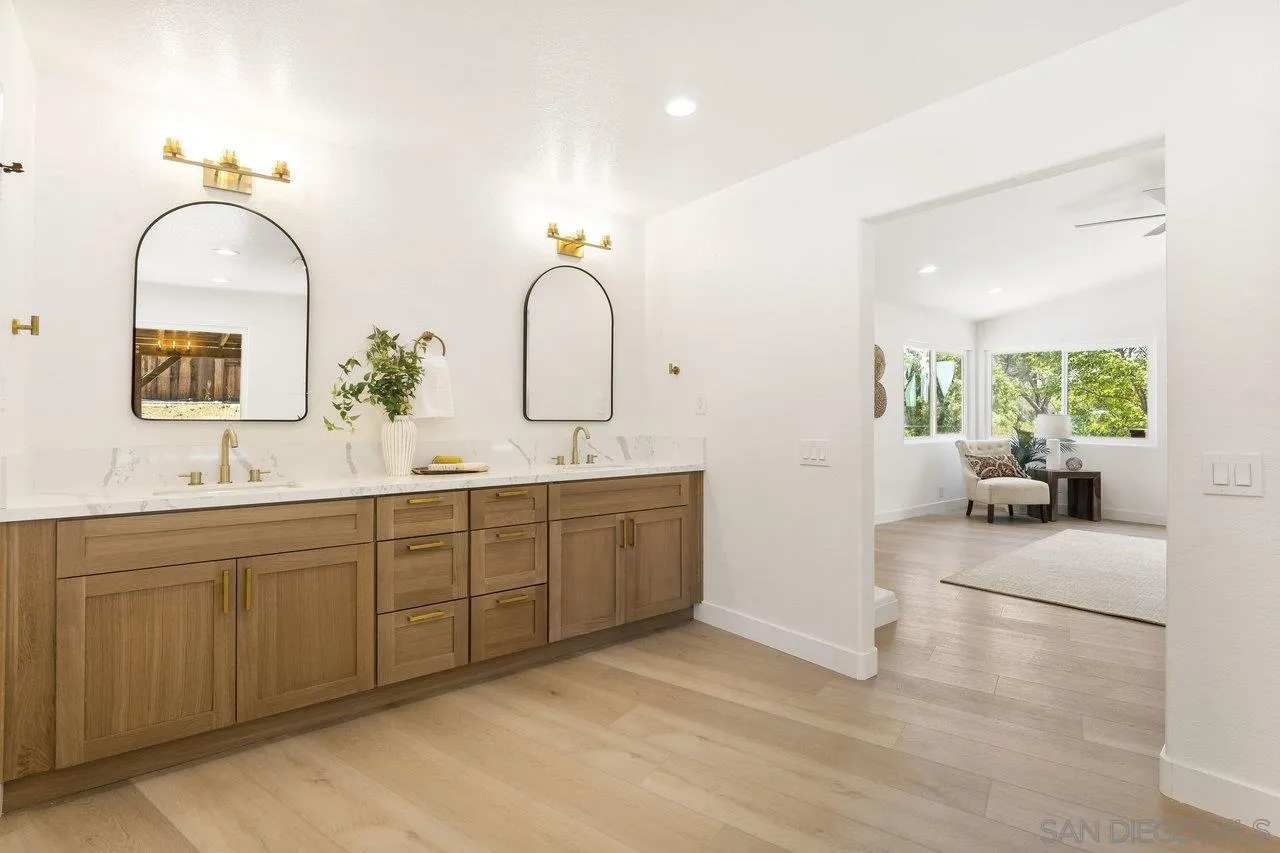 2047 Via Del Torrie Alpine, CA 91901 - Photo 34 of 53 a spacious bathroom with a double vanity sink and a mirror