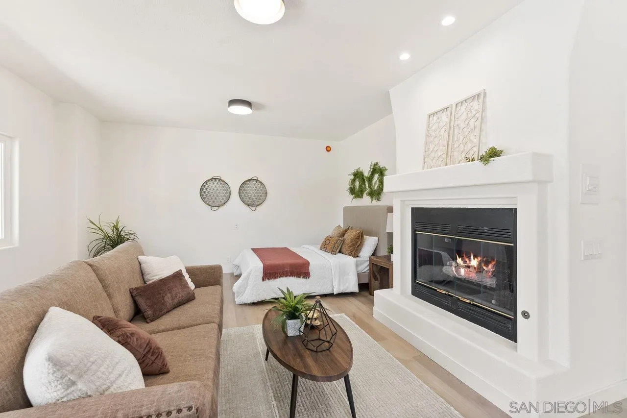 2047 Via Del Torrie Alpine, CA 91901 - Photo 46 of 53 a living room with furniture a fireplace and a flat screen tv