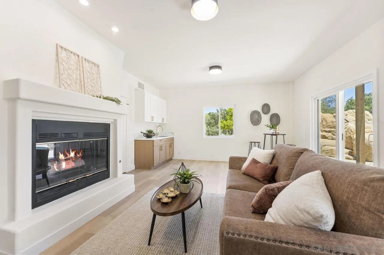 2047 Via Del Torrie Alpine, CA 91901 - Photo 47 of 53 a living room with furniture and a fireplace