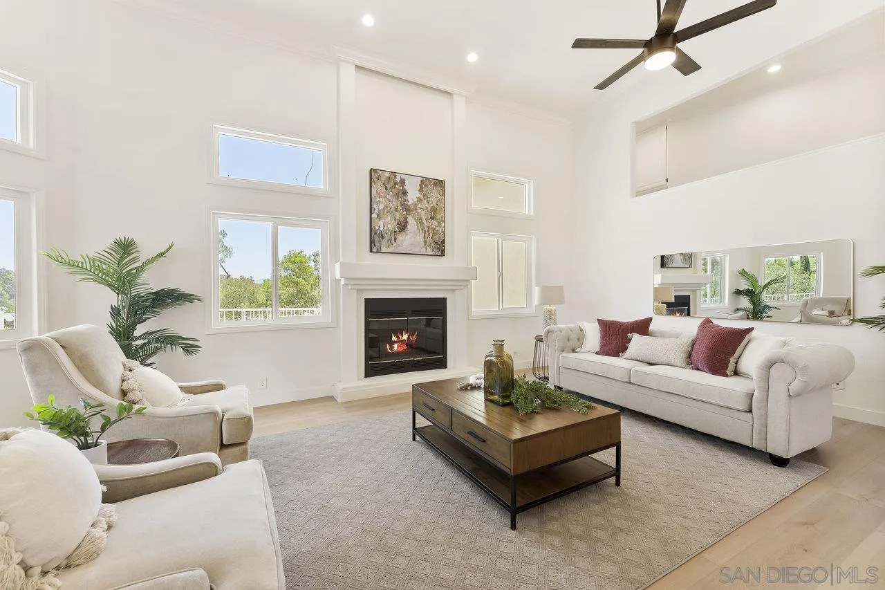 2047 Via Del Torrie Alpine, CA 91901 - Photo 7 of 53 a living room with furniture a fireplace and a potted plant