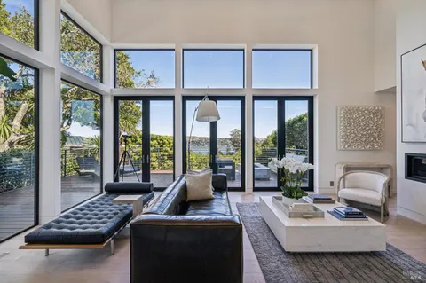 a view of a floor to ceiling window and a kitchen
