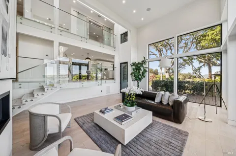 a bedroom with a bed and a painting