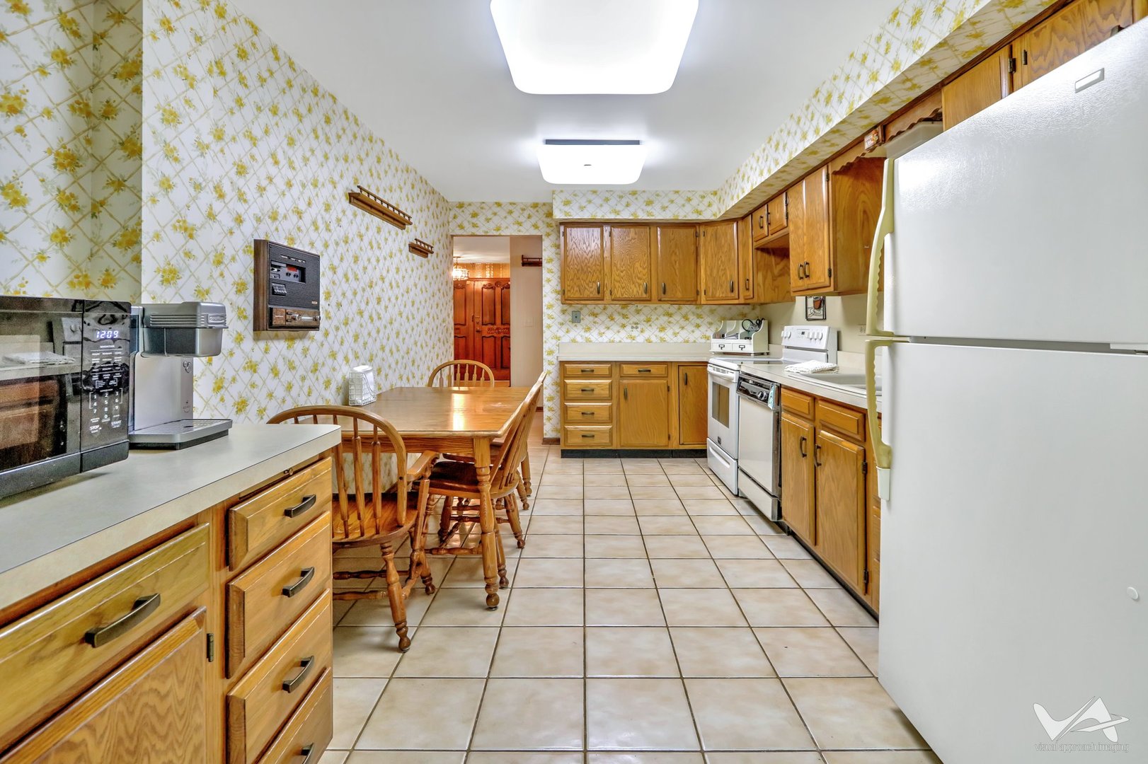 467 Hiawatha Trail, Unit 201 Wood Dale, IL 60191 - Photo 15 of 35 a kitchen with stainless steel appliances granite countertop a sink and a refrigerator