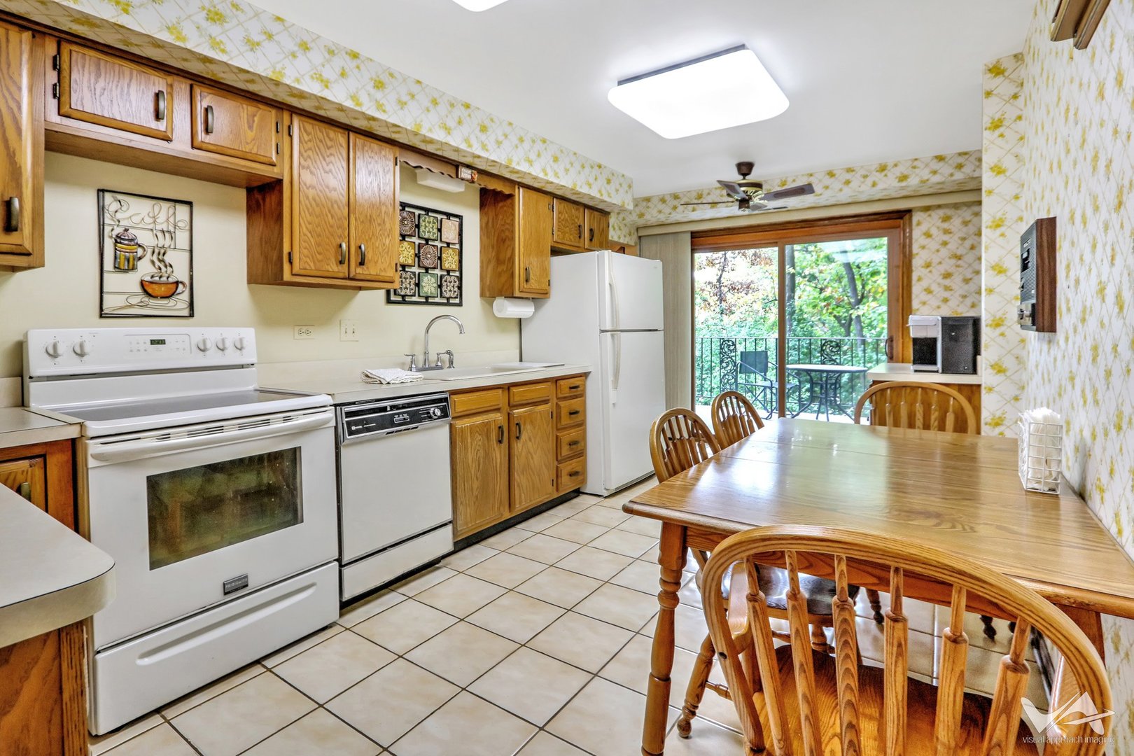 467 Hiawatha Trail, Unit 201 Wood Dale, IL 60191 - Photo 16 of 35 a kitchen with stainless steel appliances granite countertop a stove a sink and a microwave