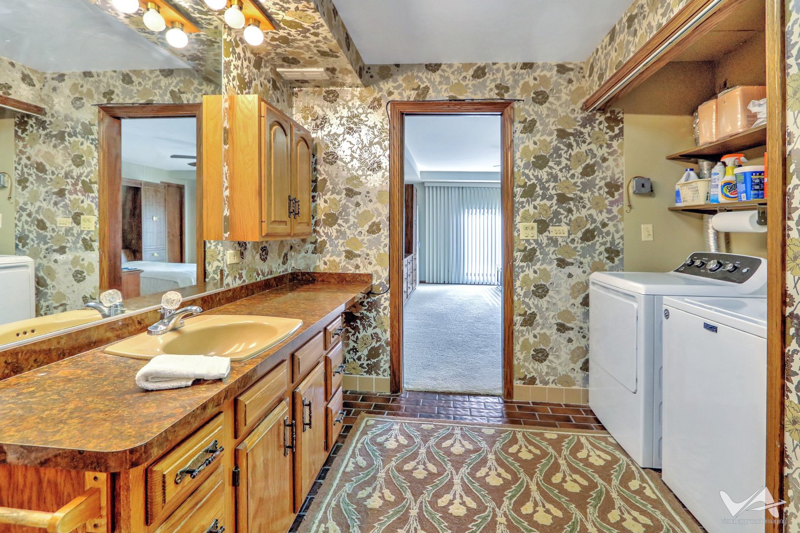 467 Hiawatha Trail, Unit 201 Wood Dale, IL 60191 - Photo 21 of 35 a bathroom with a granite countertop sink and a mirror