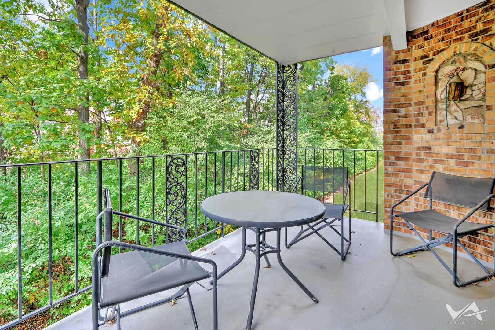 467 Hiawatha Trail, Unit 201 Wood Dale, IL 60191 - Photo 26 of 35 a view of a chairs and table in patio with a backyard