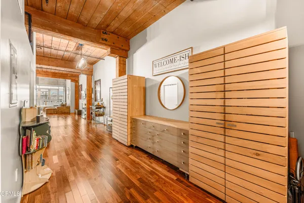 a view of workspace with wooden floor