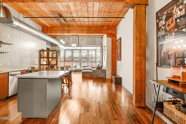 a view of a living room and dining room