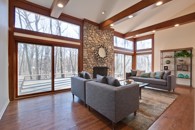 721 Rockefeller Road Lake Forest, IL 60045 - Photo 12 of 25 a living room with furniture and a large window