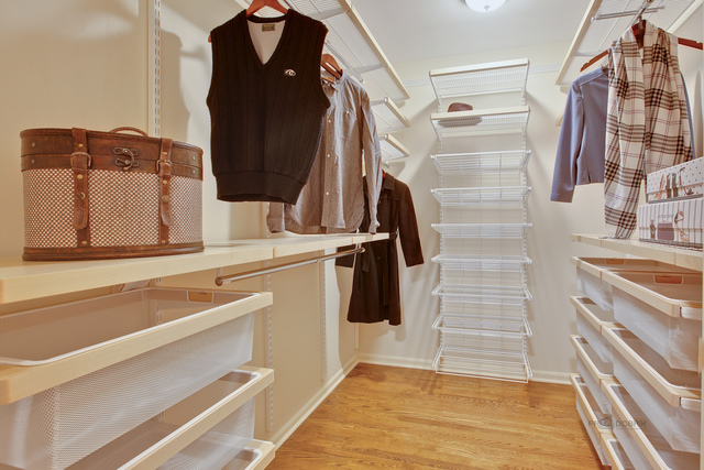 721 Rockefeller Road Lake Forest, IL 60045 - Photo 18 of 25 a bathroom with a sink and a mirror