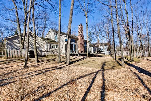 721 Rockefeller Road Lake Forest, IL 60045 - Photo 22 of 25 a view of a house with snow on the road