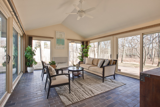 721 Rockefeller Road Lake Forest, IL 60045 - Photo 6 of 25 a living room with furniture and a large window