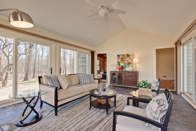 721 Rockefeller Road Lake Forest, IL 60045 - Photo 7 of 25 a living room with furniture and a large window