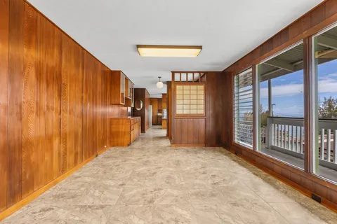 a view of hallway with livingroom