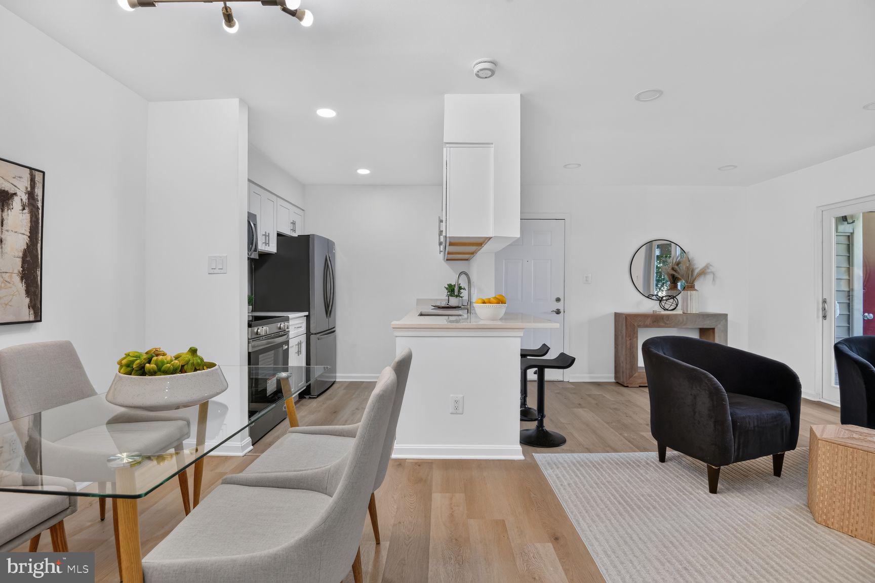 1732 Ascot Way, Unit 1732A Reston, VA 20190 - Photo 1 of 37 Open kitchen, living and dining