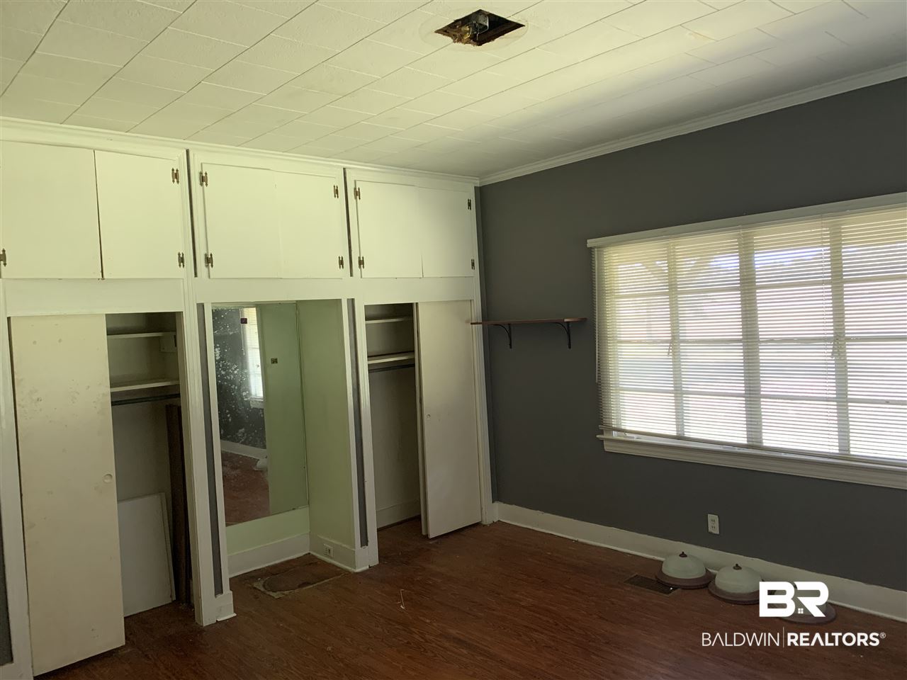 17071 County Road 52 Silverhill, AL 36576 - Photo 13 of 44 Natural light, storage, hardwoods, fan, built-ins