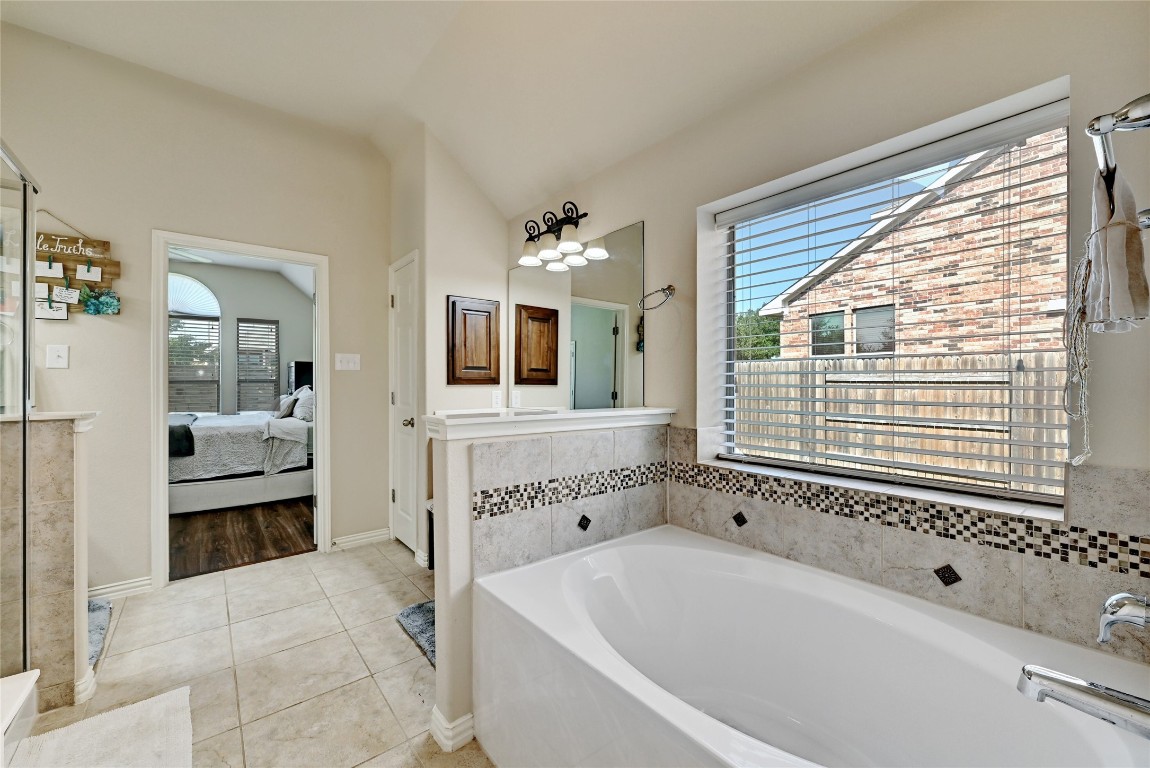 2812 St Paul Rivera Round Rock, TX 78665 - Photo 11 of 28 a spacious bathroom with bathtub and shower