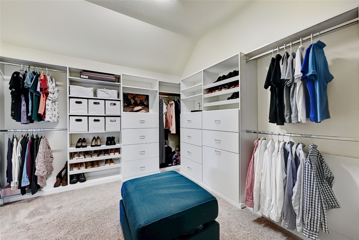 2812 St Paul Rivera Round Rock, TX 78665 - Photo 12 of 28 a view of walk in closet with clothes and shoes