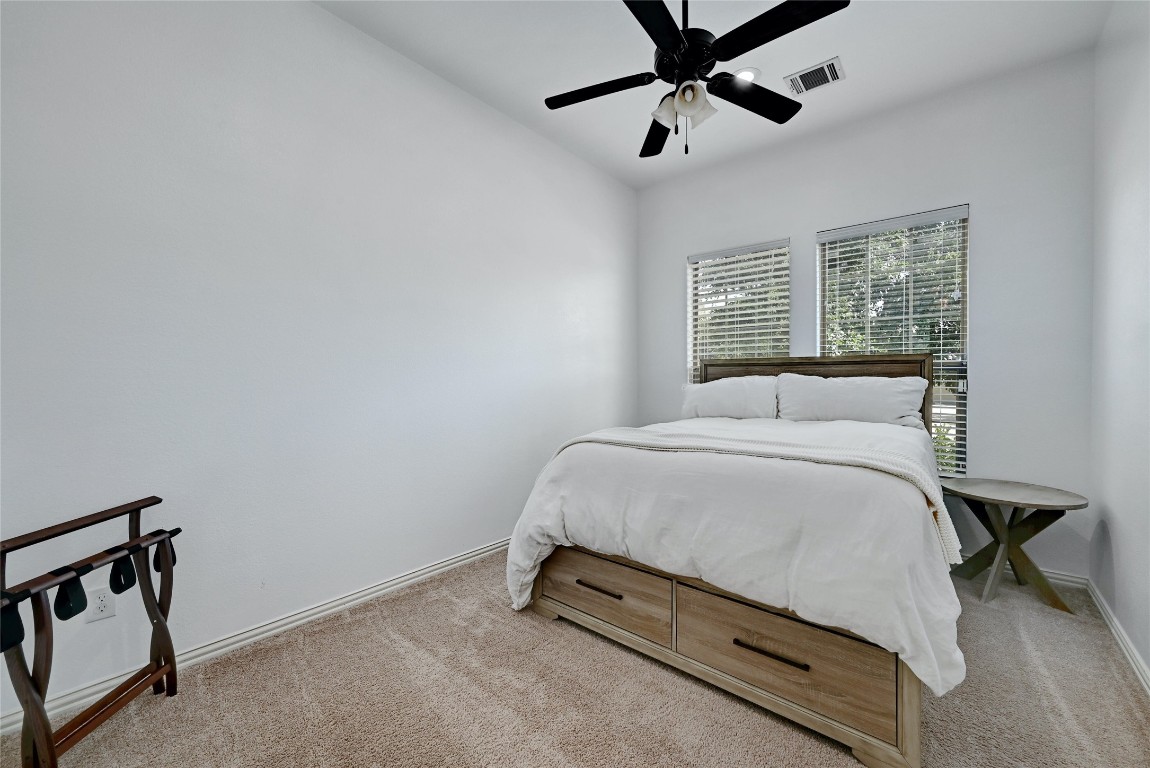 2812 St Paul Rivera Round Rock, TX 78665 - Photo 15 of 28 a bedroom with a bed and a window